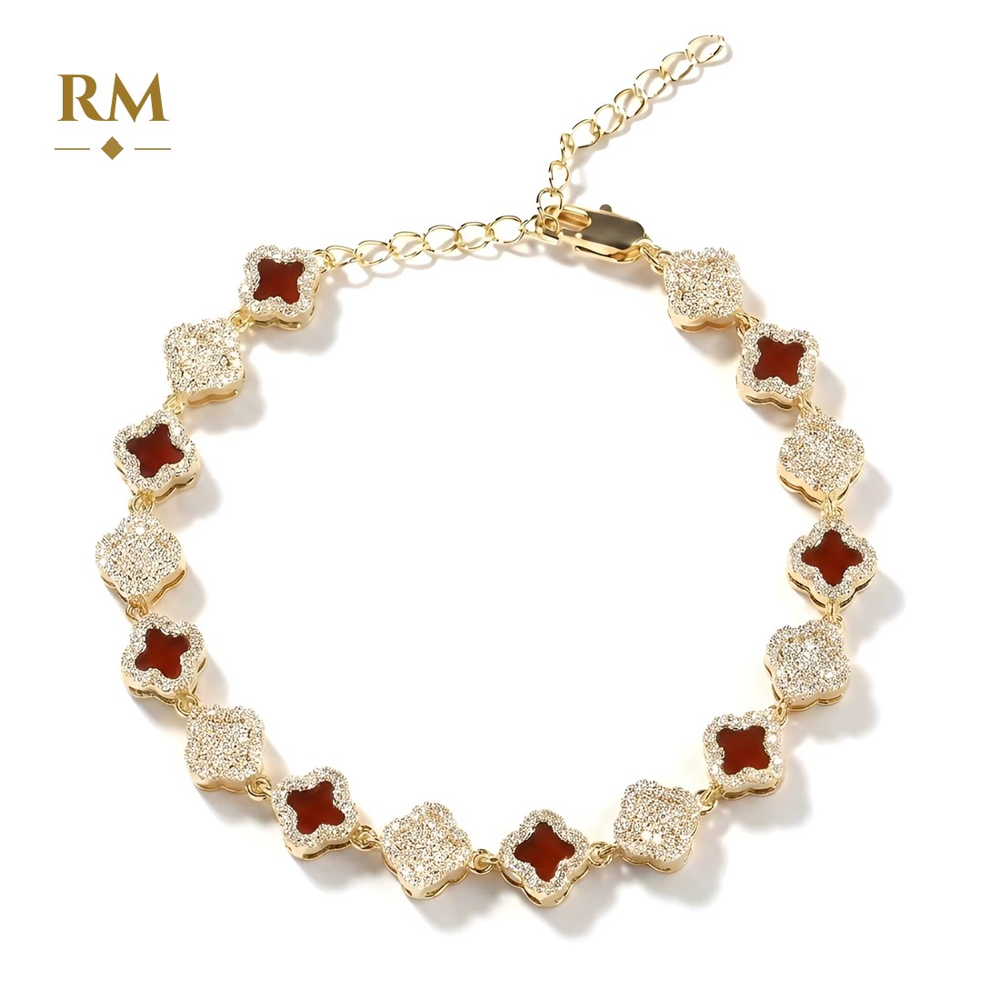Clover bracelet in gold with red stones