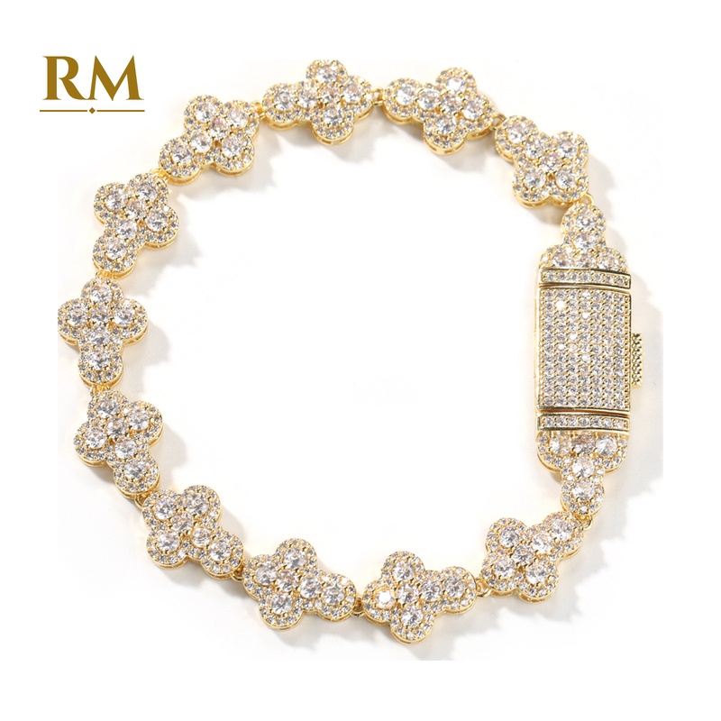 Iced cross link bracelet in gold