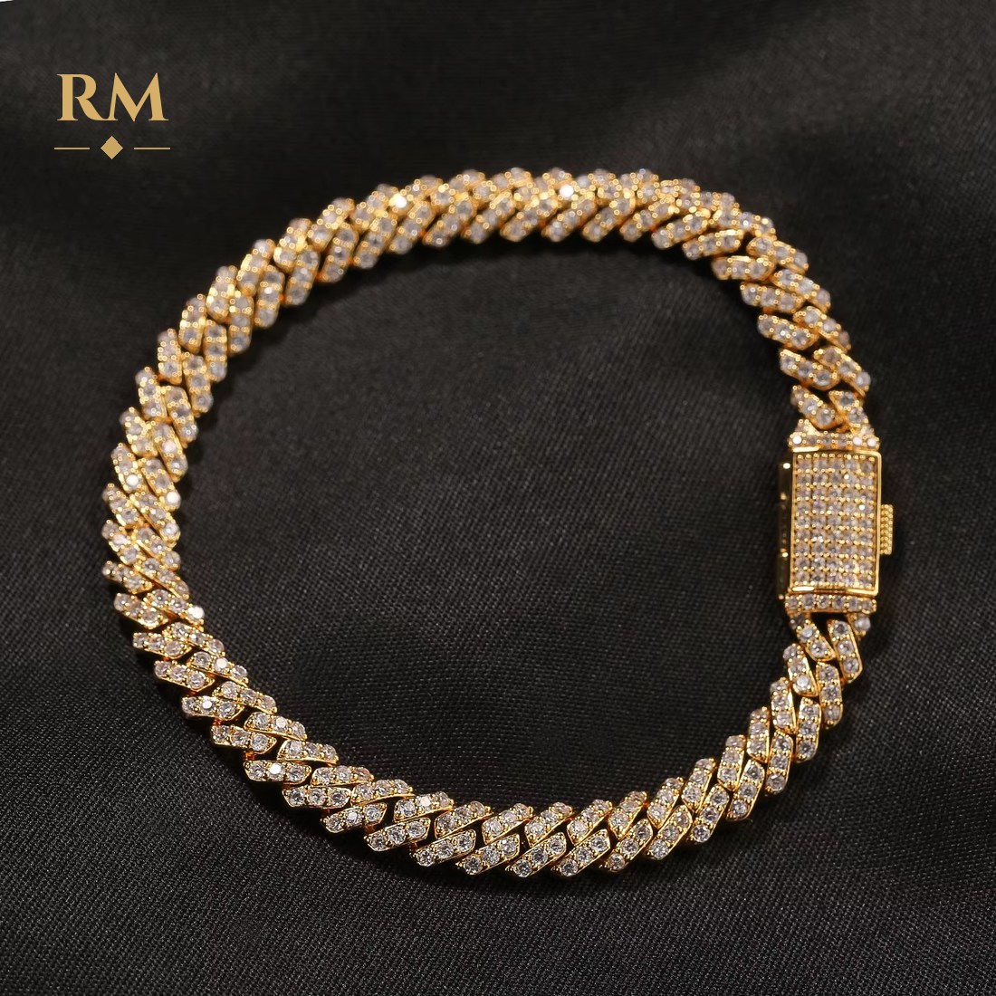 Moissanite cuban link bracelet in gold, photographed close