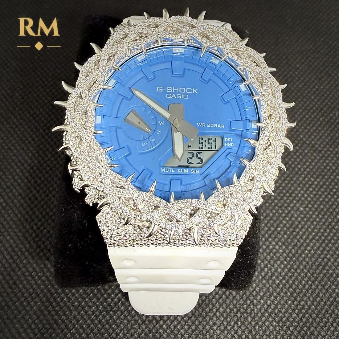 White and blue G-Shock GA-2100 with a silver thorn bezel set with moissanite