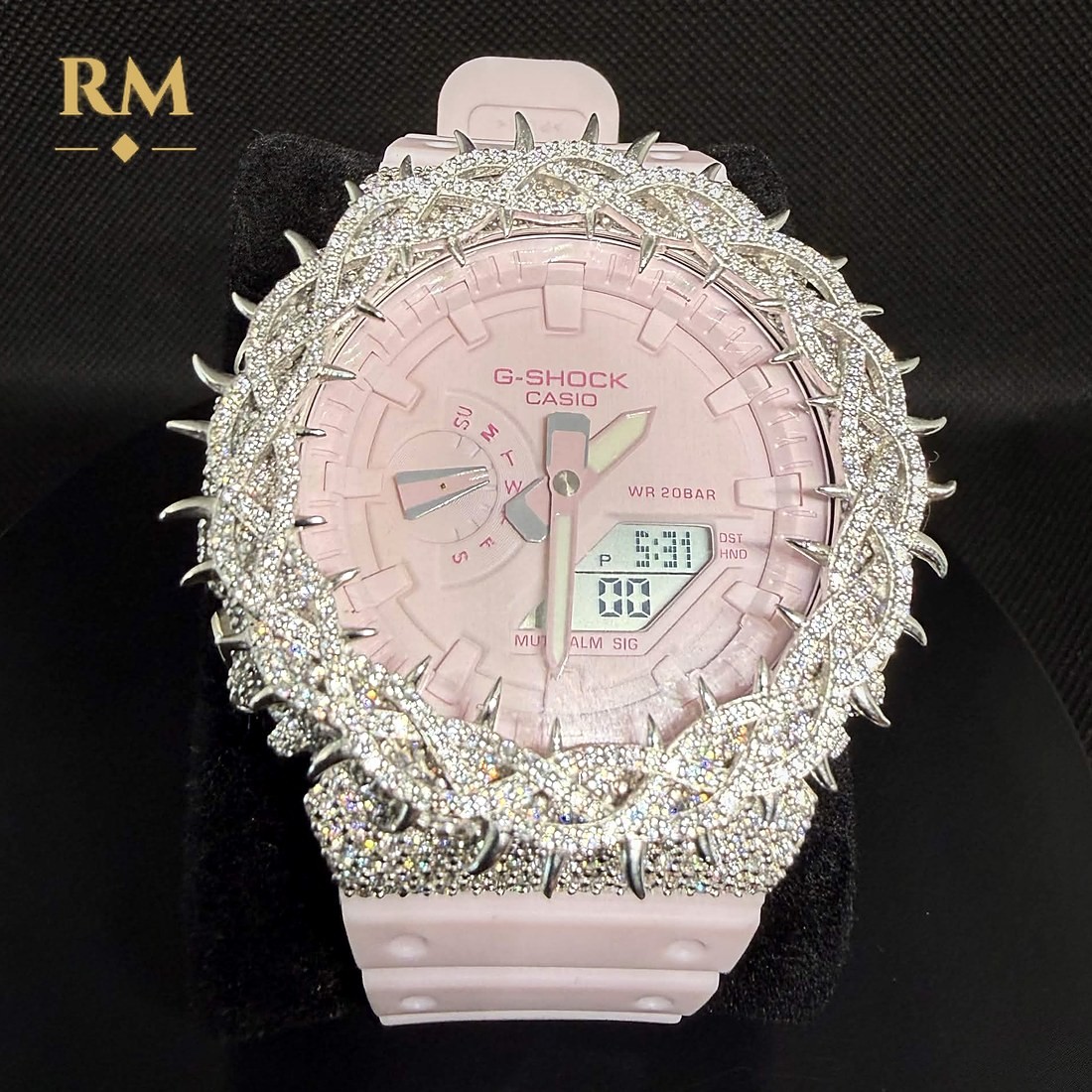 Pink G-Shock GA-2100 with a silver thorn bezel set with moissanite