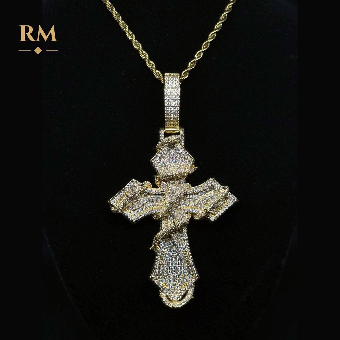 Iced thorn cross pendant in gold on a rope chain