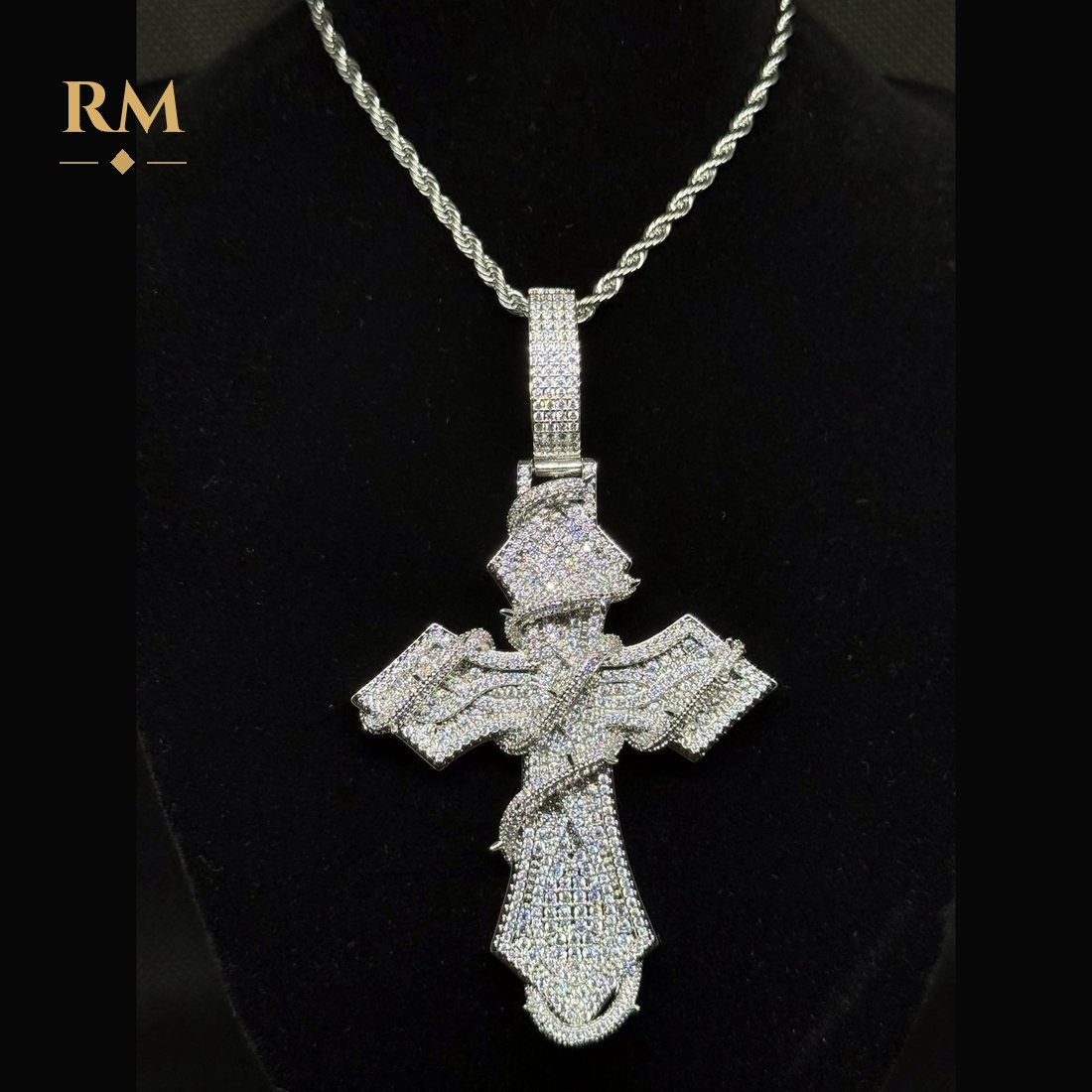 Iced thorn cross pendant in silver on a rope chain